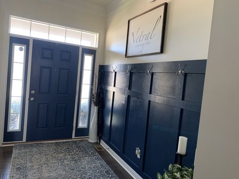 Navy wainscoting. Navy Walls White Wainscotting, Half Navy Half White Walls, Navy Blue Wainscoting, Navy Blue Board And Batten Wall, Navy Wainscoting, Dark Wainscoting Ideas, Blue Wainscoting, Basement Refresh, House Foyer