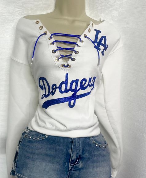 LA Dodgers off the shoulder sweater - White with blue glitter lace. Please note estimated time to ship these items is 7-10 business days as they are made to order. If you need it right away please send us a message and we will try our best to accommodate your request. Dodgers Outfit Women, Dodgers Outfit, Off The Shoulder Sweater, Sweater White, Blue Glitter, White Sweaters, Shoulder Sweater, Festival Season, Favorite Outfit