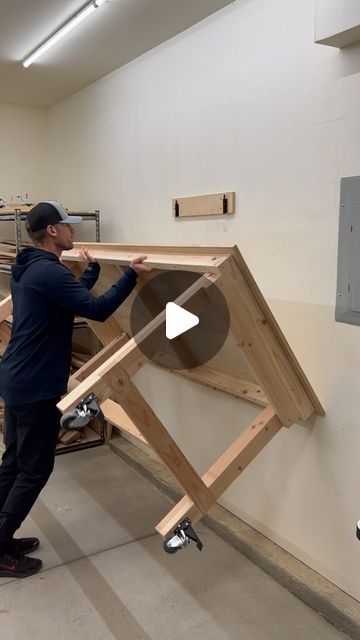 Thomas on Instagram: "Folding workbench! Click the link in my bio for written and video build plans." Small Garage Shop, Fold Down Work Bench, Folding Work Bench, Garage Workbench Plans, Garage Workshop Layout, Workbench Designs, Workbench Ideas, Folding Workbench, Garage Organisation