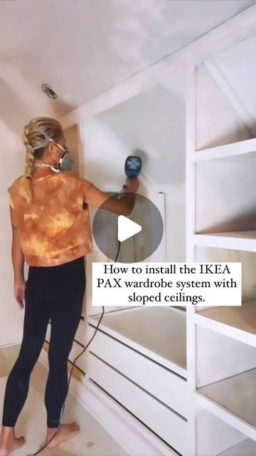 Jodi Bond on Instagram: "Here is part 1 on how I configured the IKEA PAX wardrobe system in my closet with it’s low and sloped ceilings.  I’m currrently working on Part 1 of the project which is the other side of the wall, and then I’ll be painting the space in a glorious color! Follow along for Part 2 coming at you next week!   #ikeapax #ikeahack #walkincloset #closetorganization" Ikea Attic, Ikea Pax Slanted Ceiling, Low Sloped Ceiling Closet, Ikea Hacks Sloped Ceiling, Ikea Pax Hack Slanted Ceiling, Angled Closet, Built In Sloped Ceiling, Closet In The Attic, Sloped Wall Closet