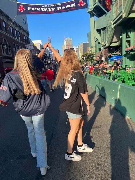 Two girls in baseball jerseys holding hands outside of Fenway park. Red Sox Game Outfit, Boston Red Sox Outfit, Baseball Game Outfit, Baseball Jersey Outfit, Red Sox Game, Pretty Mess, Game Outfit, Baseball Stadium, Fenway Park