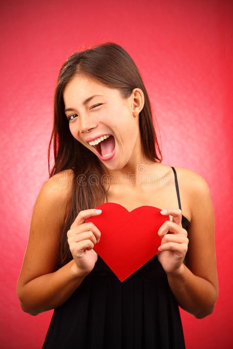 Valentines day woman. Woman holding Valentines Day heart sign. Beautiful mixed r , #Ad, #holding, #Day, #heart, #Woman, #Valentines #ad Holding Heart Pose, Holding Heart Reference, Woman Stock Photo, Face References, Holding Heart, Valentines Day Heart, Pose References, Heart Images, Valentine Photo