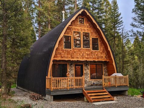 The Mossy Fox Inn, Custom designed and built by Dana Denney. This Gothic Arch cabin resides just outside Yellowstone national Park. It took three and a half years to complete the almost entirely handcrafted interior and exterior finishes. It can be seen in it's entirety at. airbnb.com/h/lostsoulslodge #cabinlife #cabinporn #yellowstone #cabinliving #mountainlife #cabinsdaily #cabins #storybook #storybookcabin #gothic #gothicarch Arched Cabin Interior Design, Gothic Arch Cabin, Arched Cabin Interior, Arch Cabins, Spanish Cabin, A Frame Cabin Interior, Gothic Cabin, Arched Cabins, Homestead Design