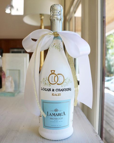 @savsandpaints shared a photo on Instagram: “Helping celebrate another sweet engagement in Oxford! Congratulations to @logan.alpe 🤩” • Oct 6, 2020 at 9:18pm UTC Painted Wine Bottle Engagement, Wedding Day Champagne Bottle, Engagement Bottle Decoration, Bridal Shower Painted Champagne Bottle, Engaged Champagne Bottle, Hand Painted Champagne Bottle Engagement, Engagement Wine Bottle, Painting A Champagne Bottle, Painted Wedding Bottle