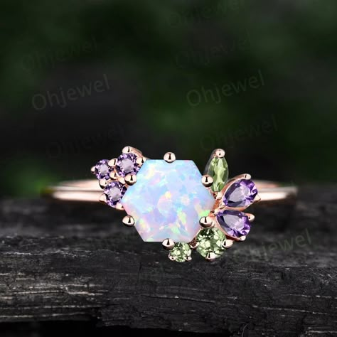 "This is a Hexagon 6x6mm  1ct Lab treated opal engagement ring in solid gold,  The accent stones are natural peridot and amethyst. The band width is about 1.4mm. It can be made in any ring size. However please contact me to custom make it to a special big or small size. It can be made in white gold,rose gold or yellow gold with 14k or 18k. However for some people who are nickel allergic,I can also make it to 925 sterling silver to make you can wear it. The ring is handmade,very high quality! 30 days money back guarantee. Returns & Warranty 30-Day money back guarantee (starting from the day of delivery). \"Made to Order\" purchases qualify for our 30-day money back guarantee. The 30-day money back guarantee gives you time to make sure your purchase is perfect. If you need to  return it for Opal Ring Unique, Unique Amethyst Engagement Rings, Opal And Amethyst Ring Engagement, Opal And Peridot Ring, Unusual Wedding Rings Women, Opal Cluster Ring, Lilac Jewelry, Natural Opal Jewelry, Engament Rings