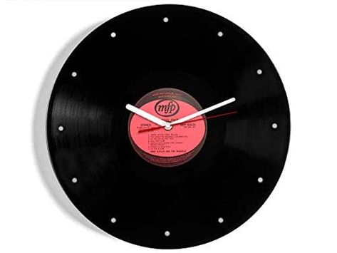 Stylish original clock crafted from an original 12" vinyl record. Would look great on any music lovers' wall. New silent Quartz clock mechanism. Hand style can be changed. Pictured with and without hour spots. Pictured on side 1. Can be made on side 2 if preferred. Just contact us. Comes in a cardboard presentation box. The Fratellis, Clock Craft, Record Bowls, Shirley Bassey, Hand Style, Vinyl Record Wall, Record Wall, Buddy Holly, Rock N Roll Music