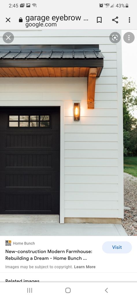 Wood Accent Over Garage Door, Eyebrow Garage Door, Garage Door Eyebrow, Garage Awnings, Eyebrow Roof Over Garage Door, Eyebrow Over Garage Door, Garage Eyebrow, Garage Door Exterior, Ranxh House Wood Garage Door