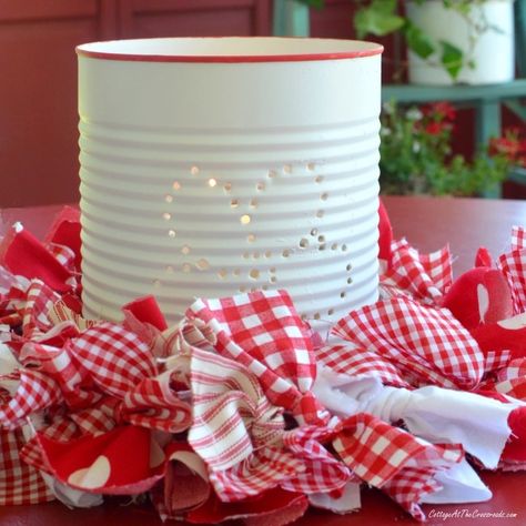 Create these easy DIY punched tin can lanterns for all of your upcoming summer celebrations by following our step-by-step directions. Can Lanterns, Tin Can Lanterns, Recycled Tin Cans, Tin Can Art, Aluminum Can Crafts, Cute Diy Projects, Crafts For Teens To Make, Punched Tin, Recycled Tin