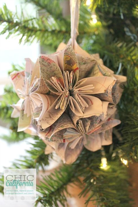 Consider this folded flower ornament the perfect decoration for those regularly bitten by the travel bug.  Get the tutorial here.   - Redbook.com Easy To Make Christmas Ornaments, Homemade Christmas Ornaments Diy, Homemade Christmas Ornaments, Homemade Christmas Tree, Map Ornaments, Diy Christmas Ornaments Easy, Paper Ornaments, Easy Christmas Diy, Christmas Ornaments Homemade