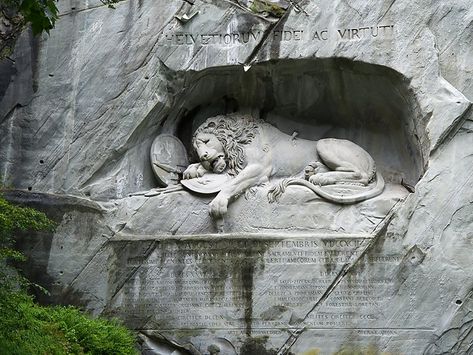 Lion Monument in Lucerne, Switzerland | Sygic Travel    #wanderlust #landscape #travel #traveling #travelgram #traveler #blogger #beautifuldestinations #photooftheday #photography #vacation #traveladdict #blog #explore #travelphotography #beautiful #followme #europe Lion Of Lucerne, Lion Monument, Bertel Thorvaldsen, An Ember In The Ashes, Ember In The Ashes, Swiss Guard, Sculpture Relief, Lorenzo Bernini, Lucerne Switzerland