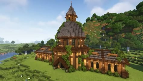 a building primarily built out of oak, dark oak, and spruce wood with deepslate roofs. it is a cylinder with rectangular sections coming off either side Villager Trading Hall Minecraft, Minecraft Pyramid, Villager Trading, Things To Build In Minecraft, Minecraft Library, Minecraft Build Ideas, Build In Minecraft, Things To Build, Minecraft Building Ideas