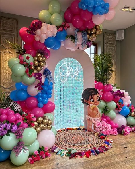 Balloons & Event Decor! on Instagram: "💕🍃Baby Moana🍃💕 1st birthday & Christening combined! What a cool theme to have ! We did a remake of a similar setup from a few years ago! I love how different this theme is for a christening though 🥹😍❤️ Baby moana is just the cutest 🙌 . . . . . . . #babymoanaparty #moanaballoons #1stbirthdayballoons #moanaparty #balloondecor #balloonwall #balloondecorations #girlyballoons #christeningballoons" Moana Balloon Arch Ideas, Second Birthday Theme Ideas, Moana 1st Birthday Party Ideas, Moana 1st Birthday Photoshoot, Moana Birthday Backdrop Ideas, Moana Birthday Party Balloon Garland, Moana 1st Birthday, Moana Birthday Theme, Disney Birthday Theme