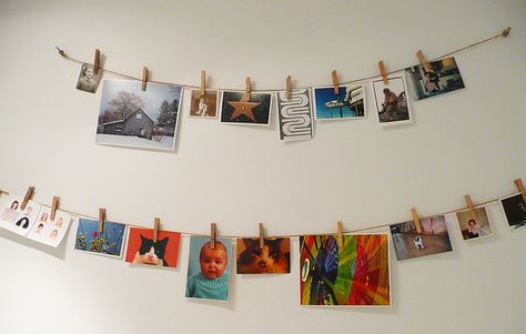 Nice way to display photos and other inspiring ephemera. Hanging Art With Clothes Pins, Clothesline Picture Display, Picture Clothesline, Diy Clothesline, Photo Clothesline, Clothesline Pictures, Pin Pictures, Photo Hanger, Hang Photos