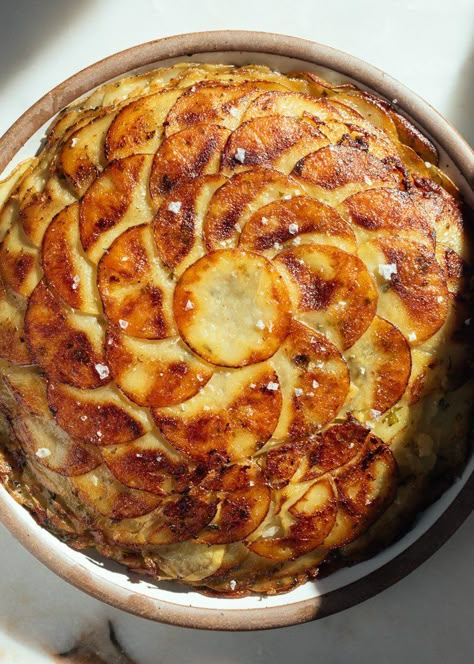 Pommes Anna with Garlic Herb Butter — saltnpepperhere Layered Potatoes, Potatoes Anna, Homecooked Food, Pommes Anna, Potato Stacks, Flakey Salt, Layered Potato, Red Skin Potatoes, Classic French Dishes