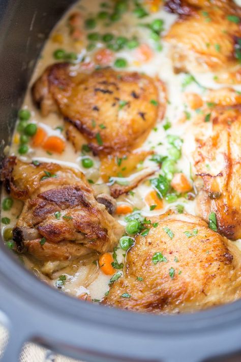 Slow Cooker Crispy Chicken Pot Pie with crispy chicken thighs and your favorite pot pie vegetables is the perfect fall meal with just a few minutes of prep. Chicken Pot Pie Slow Cooker, Pot Pie Slow Cooker, Slow Cooker Chicken Pot Pie Recipe, Chicken Pot Pie Dinner, Slow Cooker Chicken Pot Pie, Crockpot Chicken Pot Pie, Crockpot Chicken Thighs, Slow Cooker Chicken Thighs, Crispy Chicken Thighs