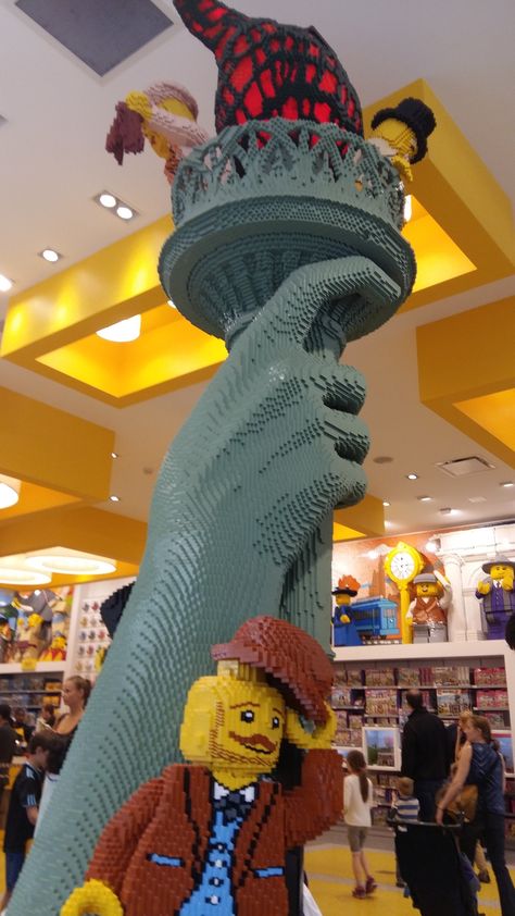 The LEGO store in New York City is a must-visit destination for fans of the iconic building blocks. The store features a wide variety of LEGO sets, including exclusive and hard-to-find items. There is also a large pick-a-brick wall where customers can fill their own cups with the specific bricks they need. The store also has a life-size LEGO model of the Empire State Building, which is a great photo opportunity for visitors. Brick Lego, Photo Opportunity, Lego Store, The Empire State Building, Lego Models, Iconic Buildings, Lego Brick, Lego Sets, Life Size