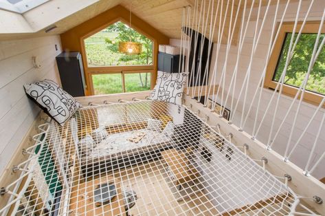 French Tiny Home Has A Netted Loft Area Under A Skylight That Functions As A Cozy Reading Nook Loft Area, Tiny House Company, Reading Space, Cozy Loft, Aluminium Cladding, Micro House, Big House, Cozy Reading Nook, Yanko Design