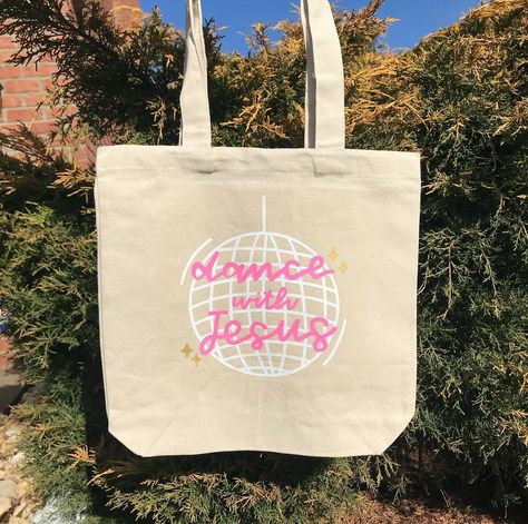 christian tote bags for summer - cute designs that help start conversations about Jesus!! 🩷🫶 get 20% off in my Etsy shop (that includes tote bags!!) through 4/29 🛒💖 click the link in my bio to shop! 🫶 •••••••••••••••• #christian #christiangirl #christianliving #christiantotebags #bible #biblejournaling #biblejournalingcommunity #christianwomen #christianwomencommunity #giftsformom #christianapparel #biblejournalinglife Tote Bag Design Ideas Paint Easy, Christian Tote Bags Diy, Bible Bag Painting, Jesus Tote Bag Painting Ideas, Bible Bag Ideas, Bible Tote Bag Diy, Christian Tote Bag Design Diy Paint, Bible Bags Totes Diy Paint, Bible Tote Bag Painting Ideas