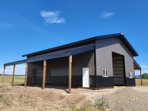 36' x 48' x 16' with (2) 12' x 48' open lean-tos featuring 12' x 14' overhead door, (2) 4' x 3' windows and 2' overhangs. Thinking about building? Now scheduling for spring 2023. Give us a call today to start your dream build 800-833-9997 View more builds on our online gallery: https://steelstructuresamerica.com/garages-shops⁠ #garage #customshop #steelstructuresamerica #mancave Metal Building With Loft, Shop With Overhang, Metal Shop Interior, Shop With Lean To On Both Sides, 50x60 Shop, Pole Barns With Living Quarters, Pole Barn With Living Quarters, Shops Garage, Pole Building Garage