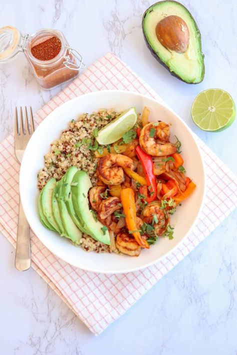 Shrimp Fajita Bowl is a quick and flavorful healthy option if you are craving fajitas but don't want to eat tortillas. Made with juicy, perfectly spiced shrimp, fresh peppers and onions, it's served over quinoa that's brightened with lime juice and cilantro. It is an easy and fun gluten free dinner idea and it's great for meal prep, too! Mushroom Cauliflower Rice, Buffalo Chicken Thighs, Cilantro Lime Quinoa, Shrimp And Quinoa, Sauteed Peppers And Onions, Lime Quinoa, Sauteed Peppers, Fajita Bowls, Healthy Mexican