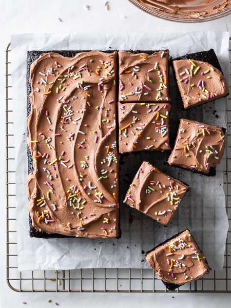 A decadent olive oil chocolate snack cake, that you would never believe was also vegan! Comes together in one bowl and is topped with vegan chocolate buttercream and rainbow sprinkles. This is a birthday cake anyone can enjoy! Get the recipe on forkknifeswoon.com #chocolatecake #vegan #depressioncake #oliveoil #birthdaycake #eggfree #sheetcake Vegan Chocolate Buttercream, Chocolate Snack Cake, Chocolate Olive Oil Cake, Olive Oil Cake Recipe, Oil Cake, Cake Vegan, Olive Oil Cake, Chocolate Snacks, Rainbow Sprinkles