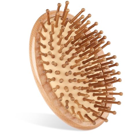 PRICES MAY VARY. Without Handle Design: This oval bamboo hairbrush features an innovative without handle design, providing a beautiful arc and curve to fit perfectly in your palm, making it easy to hold. Thanks to the lack of a handle, bamboo scalp massaging is also easier to maneuver, giving you better control over your styling Eco-Friendly Materials: The natural bamboo hair brush body is made entirely of bamboo and natural rubber, make it is eco-friendly. The round portable bamboo comb effecti Mini Hairbrush, Hair Wishlist, Bamboo Hairbrush, Bamboo Massage, Bamboo Comb, Bamboo Hair Brush, Fresh Aloe Vera Gel, Bamboo Brush, Pure Aloe Vera