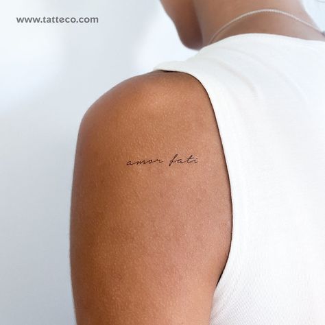 Amor fati temporary tattoo. Nº of tattoos 3 Size 1.3 in / 3.4 cm (width) Small Inner Hip Tattoos Women, Mini Collar Bone Tattoo, Love Symbol Tattoos Unique, Arm Tattoo Writing, Amore Fati Tattoo, Amor Fati Tattoo Fonts, Mini Back Tattoo, Writing Tattoos For Women, Italian Tattoos For Women