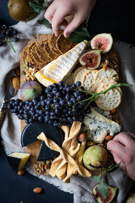 two hands picking food off a cheeseboard full of cheese, crackers and fruit Easy Thanksgiving Table Decor, Thanksgiving Table Decor Ideas, Thanksgiving Table Decor, Charcuterie Inspiration, Charcuterie Platter, Table Decor Ideas, Party Food Platters, Charcuterie And Cheese Board, Charcuterie Recipes