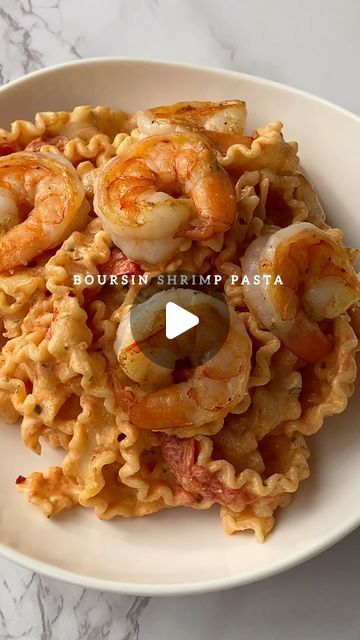 261K views · 15K likes | Sheila Williams on Instagram: "creamy boursin & shrimp pasta | a year ago my viral Boursin pasta was featured in an article on Eat This, Not That. I couldn’t believe it✨ What made it even more shocking was the day it was published, I felt a nudge inside me to google my name just for fun. I just searched “shewillevolve” and the article was there, published just a few hours before I searched my name🤯 

Recipe:
•boil pasta al dente & reserve 1/4 cup pasta water (I used 3/4 of package)
•add garlic herb boursin cheese in center of baking dish
•toss in 10oz cherry tomatoes around the cheese
•sprinkle pink salt over tomatoes 
•add in 1tbsp minced garlic over tomatoes
•lightly drizzle olive oil over everything 
•sprinkle 1tsp crushed red pepper & parsley over cheese
•bake Boursin Pasta Recipe, Boursin Pasta, Boursin Recipes, Pasta Recipes Video, Pasta Water, Boursin Cheese, Eat This Not That, Pasta Lover, Shrimp Pasta