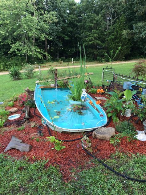 Creative Gardening Ideas | My boat project my husband an I did Boat Fish Pond Ideas, Creative Gardening Ideas, Boat Pond, Row Row Your Boat, Koi Ponds, Boat Projects, Yard Project, Fish Ponds, Garden Pond