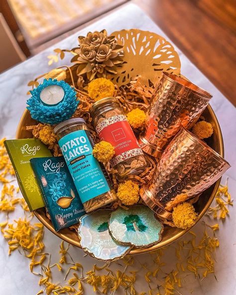 Diwali Product Shoot, Diwali Product Photography, Room Hampers For Indian Weddings, Diwali Hamper Packing Ideas, Hampers Photoshoot, Diwali Packaging, Traditional Hampers, Basket Wrapping, Diwali Presents