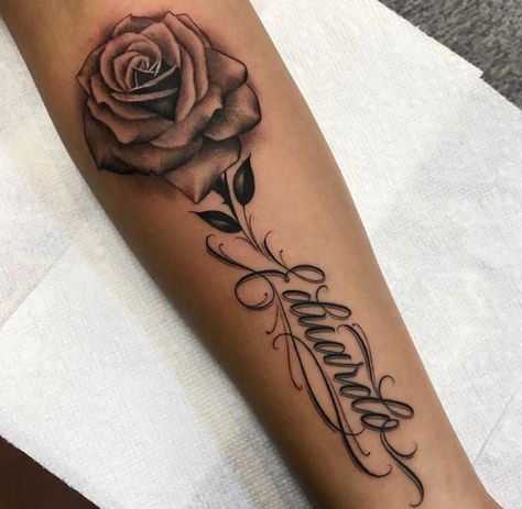 Lopez Tattoo Last Name, Rose With Name Tattoo, Rose Name Tattoo, Piece Tattoo Ideas, Forearm Name Tattoos, Rose Tattoo With Name, Rose Tattoos For Women, Hand Tattoos For Girls, Cute Hand Tattoos