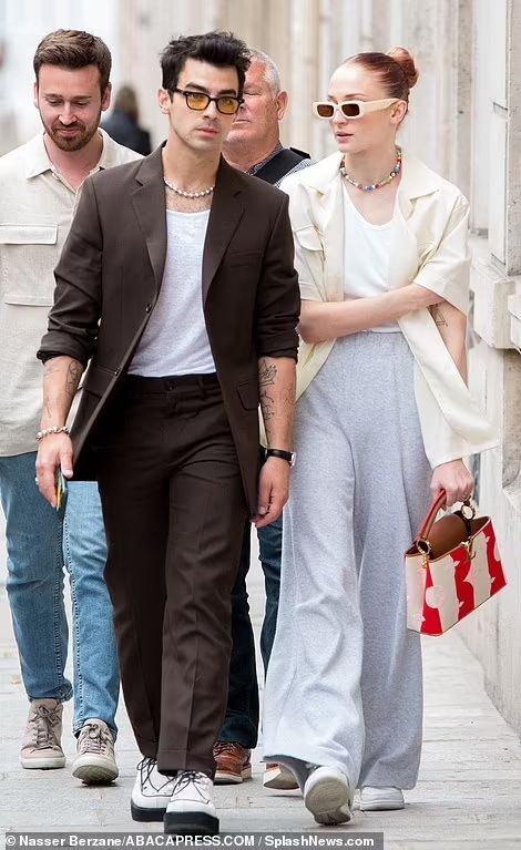 Sophie Turner joins stylish husband Joe Jonas and pals for lunch in Paris | Daily Mail Online Joe Jonas Style, Lunch In Paris, Making My Way Downtown, White Vest Top, Black High Boots, Utility Shirt, White Vest, Sansa Stark, Joe Jonas