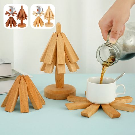 Parts List: 4×Wood Hot Pads Trivets 1×Pole Holder Highlight description: [Creative Tree Shape Trivet Set] The 4 wood trivets stored on the pole holder when not in use, forming a creative tree shape which is beautiful and add elegance to the table and countertop. And the wood trivets with elasticated leather straps that are not easy to break. When placed, the wood trivet automatically expands, and when picked up, it automatically closes. [Package Content and Size Details] This tree shape trivet set contains 4×Wood Trivets and 1×Pole Holder. The pole holder measures 23×9.5cm/9×3.7in. The wooden trivets have an expanded size of 20cm/7.8in that is suitable for hot pots, pans and other cookware. With tree shape trivet set, it is practical to protect the table and countertop. [Quality Material] Diy Wood Trivets, Wooden Trivets, Trivets Diy, Wood Placemats, Eating Table, Wood Trivets, House Items, Wood Christmas Tree, Wood House