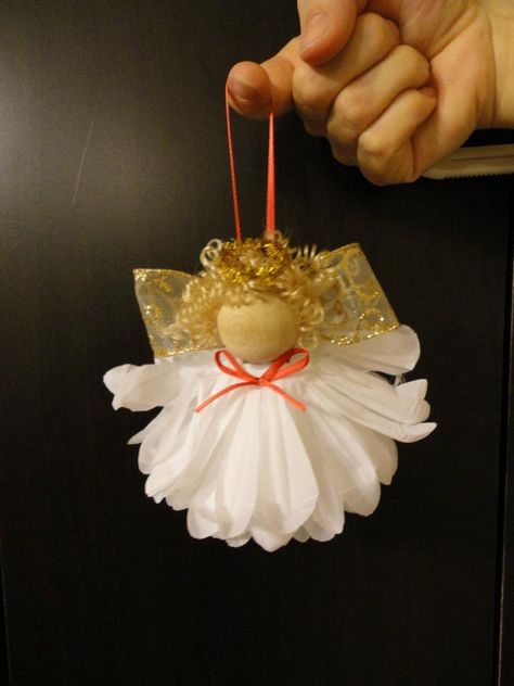 Image only-DIY: Christmas Angel Ornament (Super glue a wooden ball on top of an upside down flower. Glue on some hair. Use gold pipe cleaner to make a Halo. Add bows, and use a ribbon to make a loop to hang the ornament.) Diy Christmas Angel Ornaments, Diy Angel Ornaments, Christmas Angel Ornaments, Angel Crafts, Navidad Diy, Christmas Angel, Christmas Ornament Crafts, Handmade Christmas Ornaments, Angel Ornaments