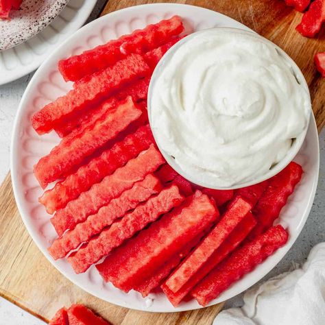 These easy watermelon fries went viral on TikTok for a reason! They're sweet, hydrating, and served with a 2-ingredient yogurt dip. How To Store Watermelon, Watermelon Basil Salad, Watermelon Fries, Watermelon Sticks, Dessert Boards, Crinkle Cut Fries, Frozen Watermelon, Cut Watermelon, Yogurt Dip