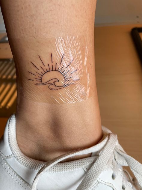 Just got my first tattoo! I’ve been pinning tats like this for years and finally got it for my 21st birthday. 🌊☀️ Chronic Ink Toronto Wave Sun Tattoo, Aiden Tattoo, My 21st Birthday, Sun Tattoo, First Tattoo, 21st Birthday, Maple Leaf Tattoo, Tattoos And Piercings, Tatting