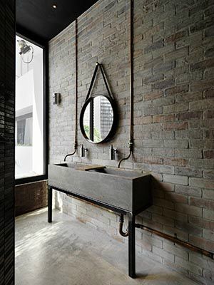 Vintage Industrial Bathroom, Grey Brick Wall, Industrial Bathroom Decor, Industrial Bathroom Design, Concrete Sink, Vintage Industrial Decor, Bad Inspiration, Industrial Bathroom, Mirror On The Wall