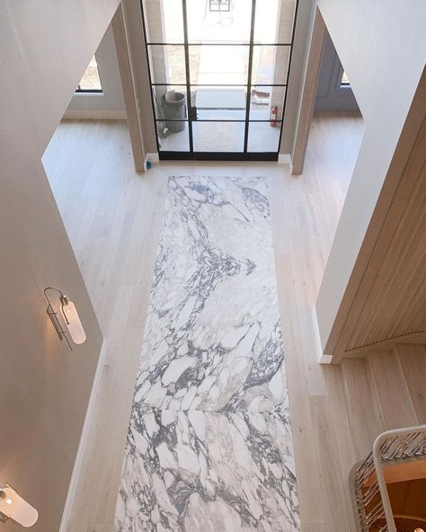 ADAM HUNTER on Instagram: “Bird’s eye view of the entrance at LA via Paris featuring a custom AH marble landing strip 💫 #AHCustomHomes” Marble Foyer Entryway, Entrance Tiles Entryway, Entryway Tile Floor, Marble Entryway, Marble Inlay Floor, Adam Hunter, Marble Foyer, Inlay Flooring, Landing Strip