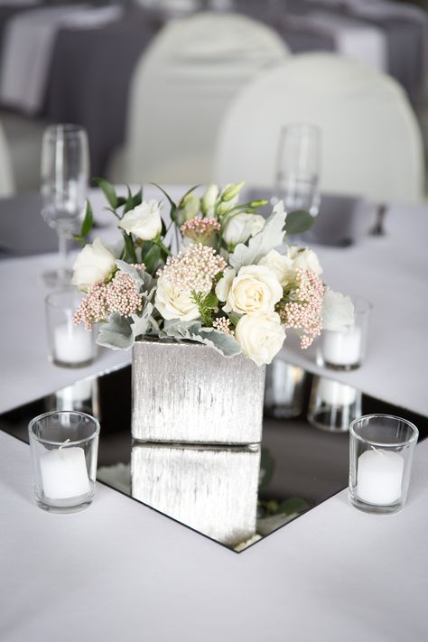 Flowers And Mirror Centerpiece, White And Silver Floral Centerpieces, Mirrored Vase Centerpiece, Square Mirror Centerpiece Wedding, Silver Centerpiece Wedding, Mirror Centerpiece Wedding, Mirror Centerpiece Ideas, Coquette Quinceañera, Mirror Wedding Centerpieces