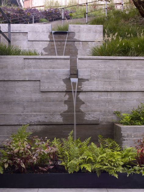 Terraced Patio Ideas, Wall Concrete, Concrete Retaining Walls, Outdoor Water Features, Garden Water Feature, Garden Waterfall, Waterfalls Backyard, Sloped Garden, Walled Garden