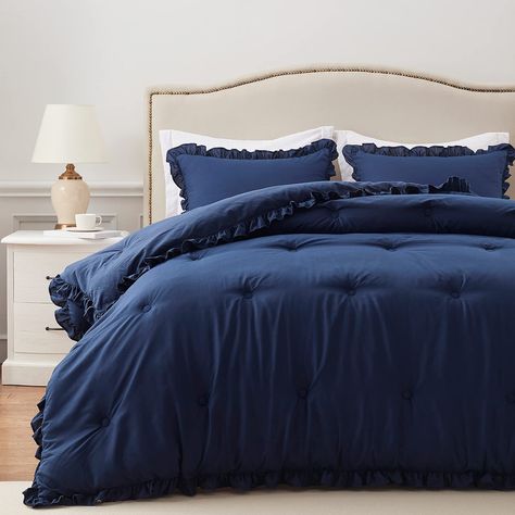 PRICES MAY VARY. 【STYLISH DESIGN】Unlike traditional and uncreative navy blue comforter sets twin, our comforter set ruffle navy has a 2-inch ruffle around it that not only makes the navy blue bedding look classy and stylish, but also enhances the feel of the entire room. 【EXQUISITE CRAFTSMANSHIP】Our navy twin comforter set is made from high-quality materials and ingenious point stitching design to ensure that it can withstand regular use without tearing and prevent the filling from shifting and Blue Comforter Bedroom, Twin Bed Comforter Sets, Navy Comforter Sets, Twin Bed Comforter, Navy Blue Bedding, Ruffle Comforter, Full Size Comforter Sets, Full Comforter Sets, Queen Size Comforter Sets