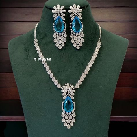 Bollywood style Doublet stone statement necklace set in silver rhodium plated finish. Necklace is made with fine quality cubic zirconium and doublet stones. Available in sky blue and yellow  color. A perfect necklace to pair with your indian, western or indowestern attire.   All orders Ship same day if placed before 4:00 PM EST  Necklace length: 15-17 inch Create beautiful memory for any occasion with elegant jewelry for your loved ones We will be happy to navigate you through the process so if Luxury Heavy Blue Necklaces, Luxury Exquisite Blue Necklace, Luxury Bollywood Necklaces With Gemstones, Elegant Blue Multi-stone Necklace, Indian Wedding Shoes, Rose Gold Jewelry Set, Luxury Blue Multi-stone Necklaces, Stone Statement Necklace, Bridal Accessories Jewelry