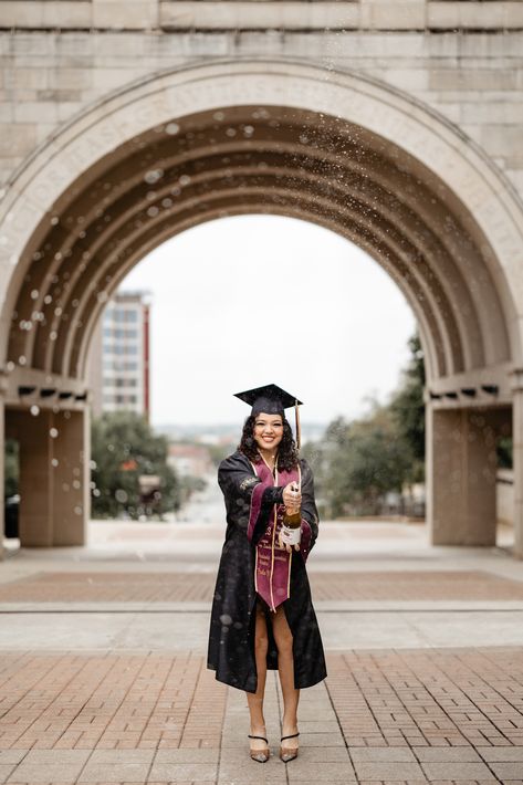 Texas State Senior popping champagne for a photo near the famous arch on campus. Graduation Outfit Ideas University, Graduation Pictures Outfits, Grad Stole, College Grad Pictures, Pictures Graduation, Graduation Dress College, White High Low Dress, College Graduation Pictures Poses, Senior Posing