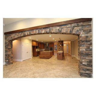 Two Island Kitchen, Door Casing Ideas, House Schemes, Craftsman Columns, Archways In Homes, Inside Kitchen Cabinets, Rustic Family Room, Stone Archway, Cottage Remodel