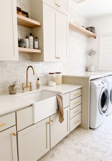 melissawilsondesign on LTK Laundry Room Finishes, Modern Coastal Laundry Room Ideas, Classic Laundry Room Design, Laundry Room Beige Cabinets, Transitional Laundry Room Design, Laundry Room Floating Shelves Over Sink, Laundry Wall Design, Mediterranean Laundry Room Design, Cream Cabinets Laundry Room