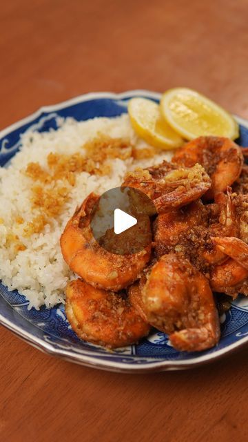 Derek Chen on Instagram: "Hawaiian Garlic Shrimp
Ingredients
* 1 lbs shrimp(shell on deveined)
* 5 tbsp butter
* 1/3 cup garlic(chopped)
* 3 tbsp rice flour
* 3 tbsp corn starch
* 2 tsp salt
* 1 tbsp paprika
* 1/2 tsp garlic powder
* 4 tbsp oil
* 1 Lemon
* Rice
Instructions
1. Cut shrimp down the middle with scissors to take out the poop using a toothpick.
2. Mince garlic and heat butter on medium low heat. Sauté the garlic for 4-5 minutes until it’s in between translucent and golden brown.
3. Combine rice flour, corn starch, salt, and paprika in a bowl. Thoroughly coat shrimp in mixture.
4. Heat oil on medium heat and cook shrimp for a couple of minutes on each side until golden brown.
5. Add the garlic butter from earlier and baste for a minute or so making sure each shrimp is coated in Hawaiian Shrimp, Hawaiian Garlic Shrimp, Fish Casserole, Hawaiian Foods, Spicy Garlic Shrimp, Cook Shrimp, Pescatarian Diet, Short Recipes, Cajun Butter