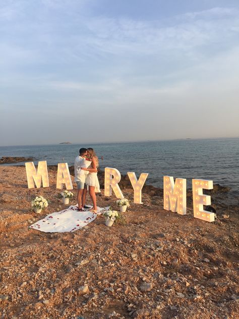 “Marry me” letters with lambs, white flowers and long white carpet for the isle. Cute Proposal Pictures, Beach Proposal Setup, Marry Me Letters, Propose Ideas, Green Apple Wedding, Proposal Set Up Ideas, Romantic Proposals, Crete Island Greece, Greek Islands Wedding