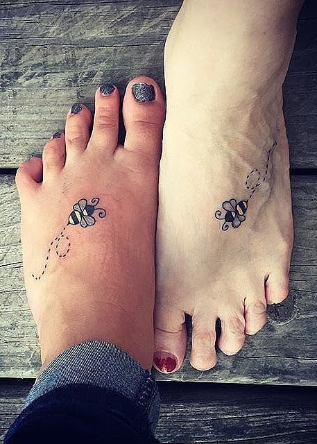 39 Mother-Daughter Tattoos A Bee Tattoo, Mother Daughter Tats, Unique Tattoos Black Women, Bee Tattoos, Mother Daughter Tattoo, Mom Daughter Tattoos, Daughter Tattoo, Christian Sleeve Tattoo, Wild Tattoo