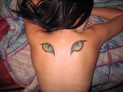 A tattoo of cats eyes on the back can be a symbol of the watchful, protective eyes of the Egyptian cat goddess Bast « « Ratta Tattoo Cat Eye Tattoos, Egyptian Cat Tattoos, Evil Eye Tattoo, Girl Back Tattoos, Free Tattoo Designs, Creepy Tattoos, Cat Tattoo Designs, Detailed Tattoo, Tattoo Designs For Girls